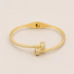 twist bangle with crystals gold plated twisted kara with stones