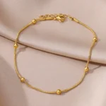 Gold round bead anklet for women flat lay – gold bead payal detail
